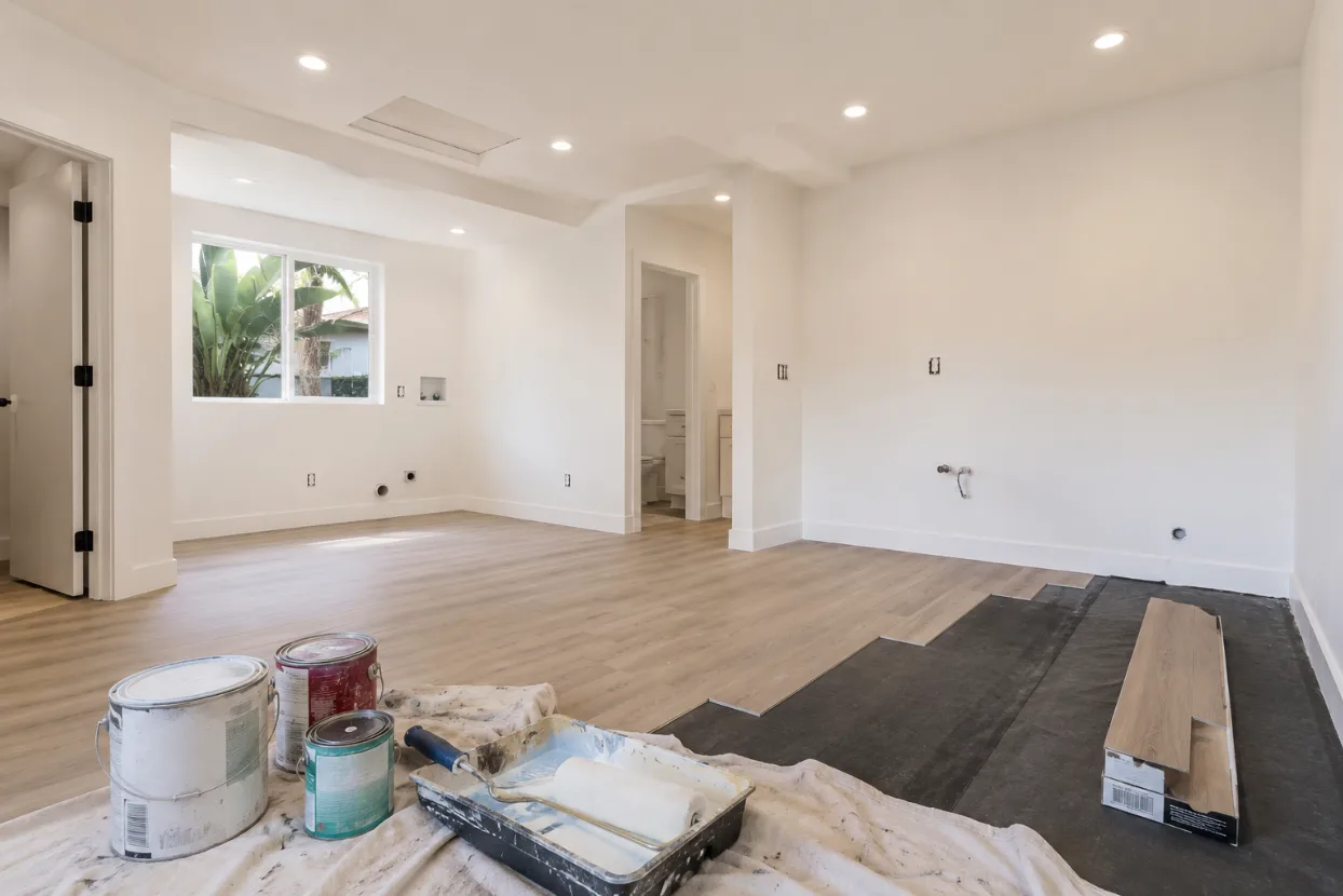 Garage being converted into an ADU living space with light low-VOC interior walls
