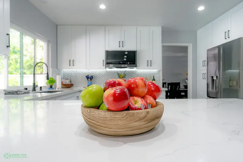 White kitchen remodel in Santa Clarita by Green Star Remodeling with quartz countertops.